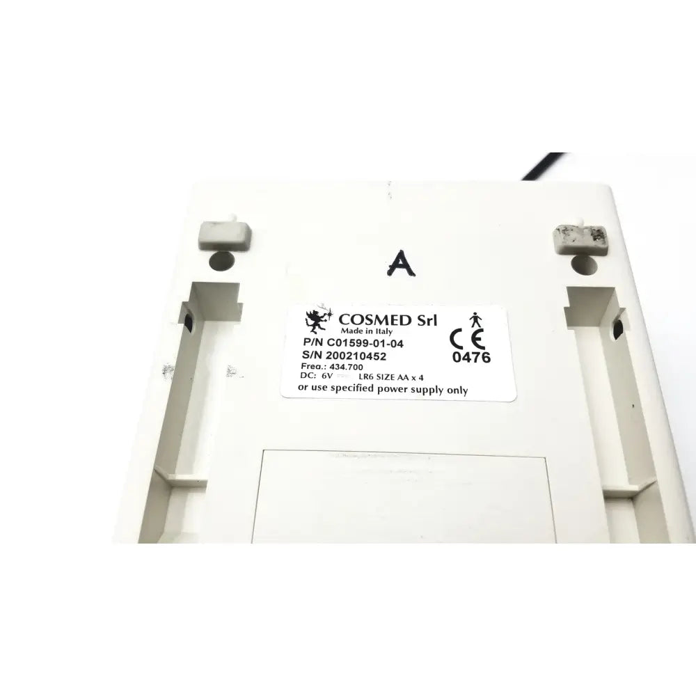 White plastic cosmed k4 b2 metabolic device back showing made in Italy label and four AA battery requirement for reuse medical
