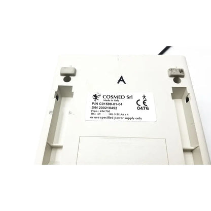 White plastic cosmed k4 b2 metabolic device back showing made in Italy label and four AA battery requirement for reuse medical