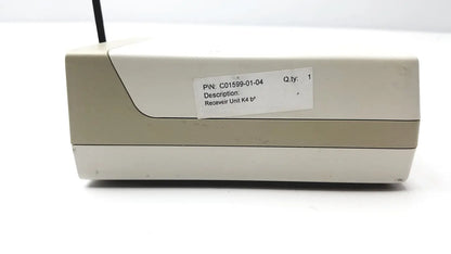 Beige plastic receiver unit with black antenna labeled k4 model from cosmed k4 b2 metabolic for reuse medical purposes