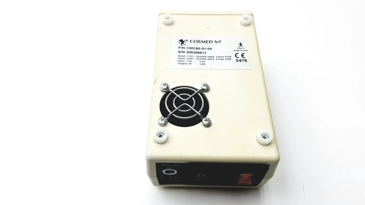 Cream-colored rectangular cosmed k4 b2 metabolic power supply unit with black fan grille and silver screws for reuse medical devices