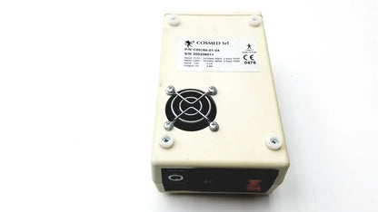 Cream-colored rectangular cosmed k4 b2 metabolic power supply unit with black fan grille and silver screws for reuse medical devices