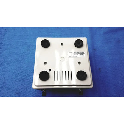 White plastic costar mini centrifuge with fixed angle 6-position rotor black caps and ventilation slits
