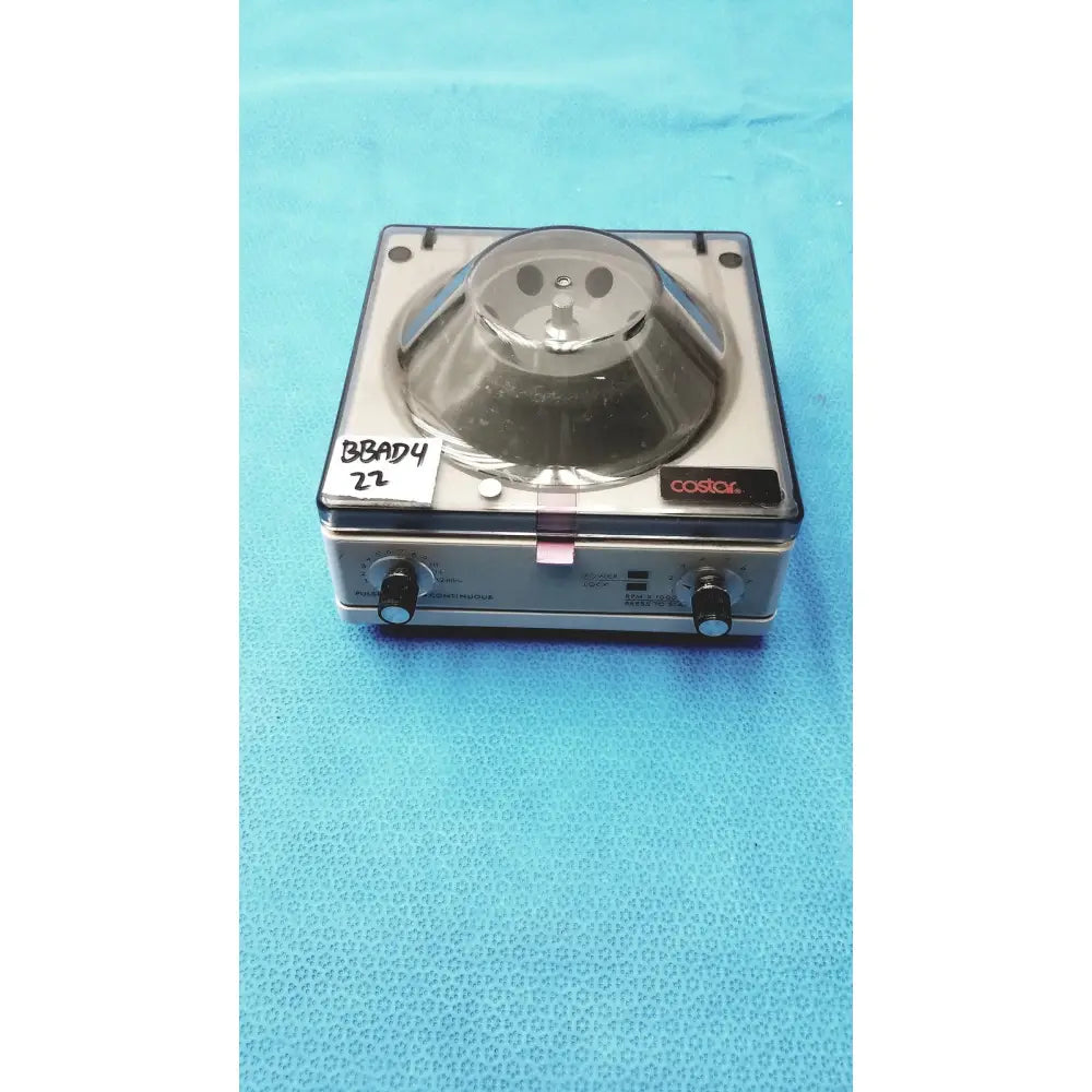 Silver and black Costar mini centrifuge with clear dome lid and fixed angle 6-position rotor for lab use
