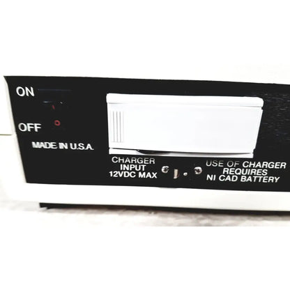 Black rectangular coulbourn bio system calibrator charger with white switch and 12vdc max input made in usa for reuse medical use