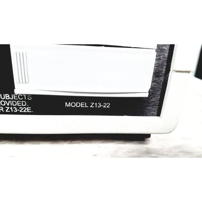 White plastic coulbourn z13-22 stimulator with black label and vertical slits on front panel for laboratory use