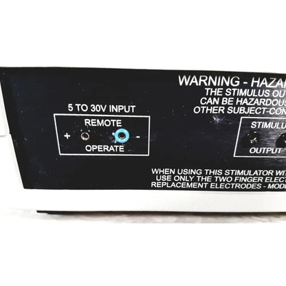 Black coulbourn z13-22 stimulator panel with white labeling and light blue knob labeled remote operate