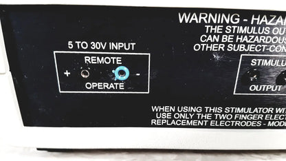 Black coulbourn z13-22 stimulator panel with white labeling and light blue knob labeled remote operate
