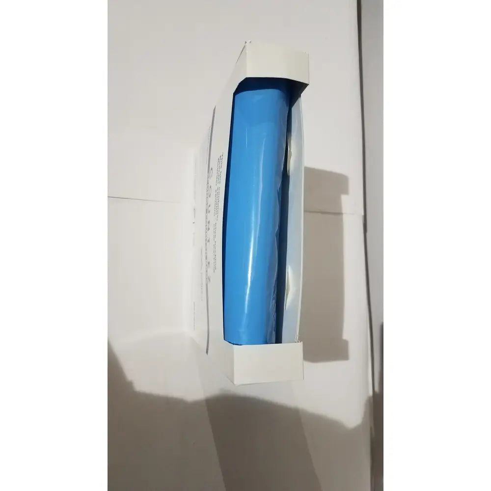 A vibrant blue glossy plastic roll of adhesive tape inside a white box for count ez sponge surgical count bags