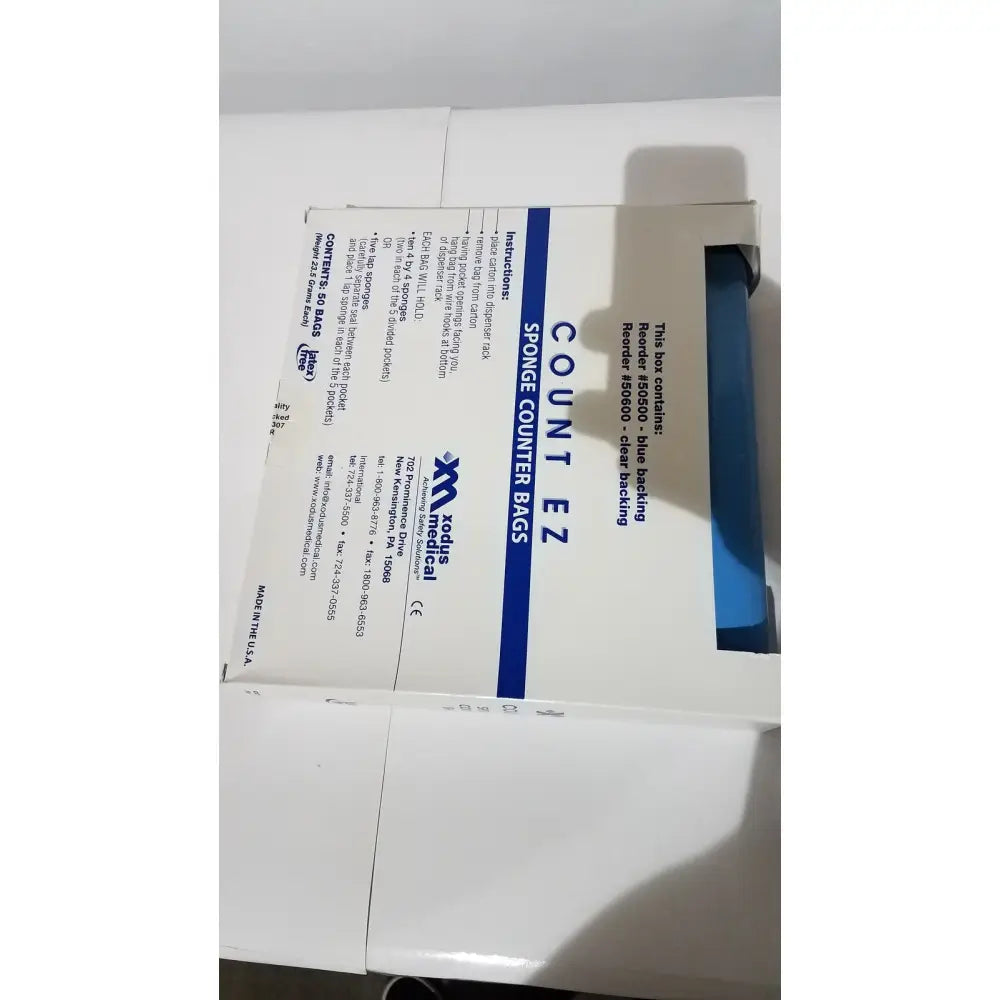 White cardboard box of medline count ez sponge counter bags sterile disposable surgical count bags 50500 label