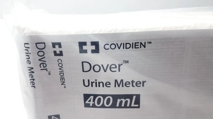 Covidien 2000 dover urine meter 400ml capacity in white plastic bag with black printed branding and measurement markings