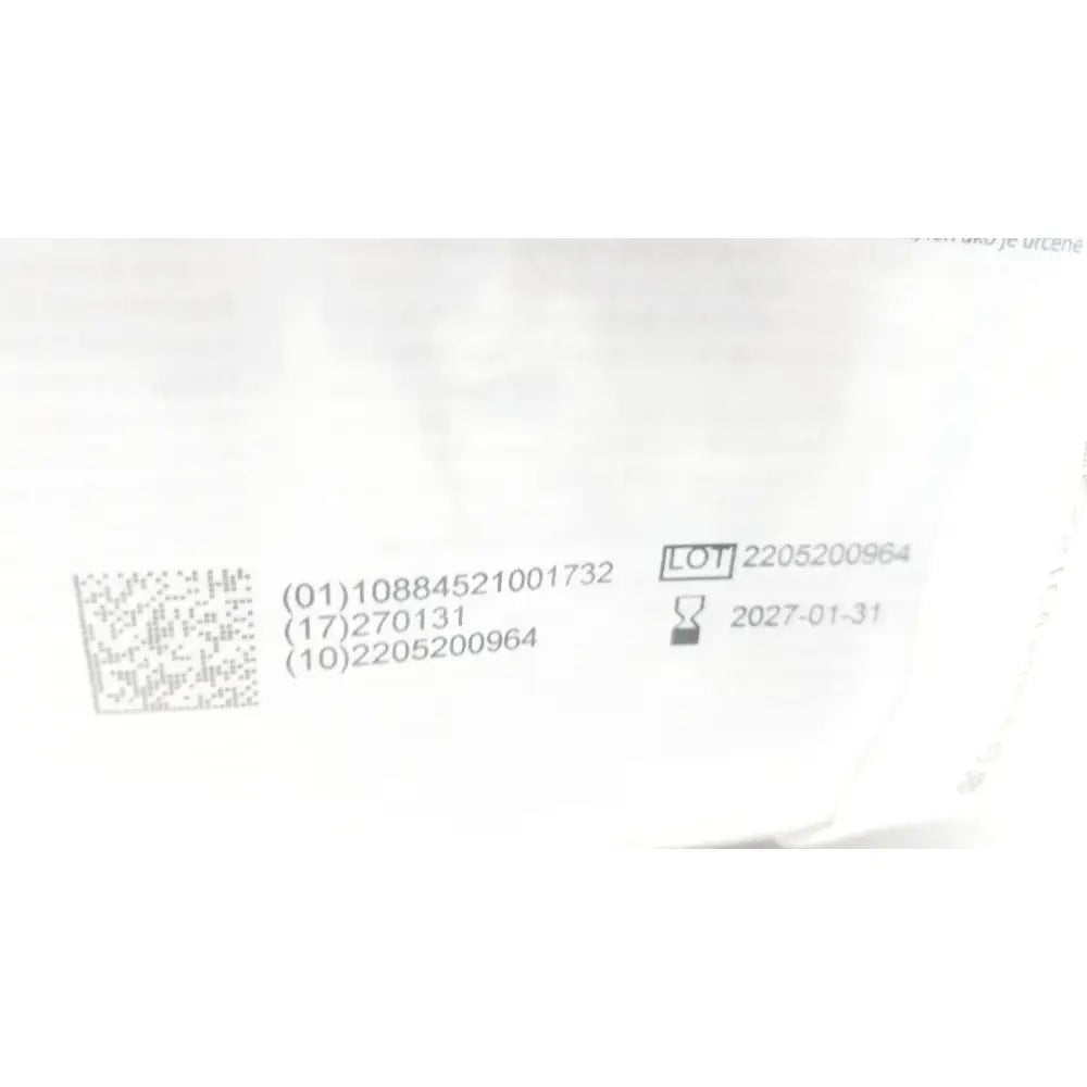 White label with black text and qr code showing lot number 2205200964 and expiration january 31 2027 on covidien dover urine meter 400ml