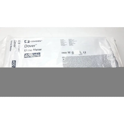 White plastic package containing a covidien dover urine meter 400ml for accurate fluid measurement in medical settings