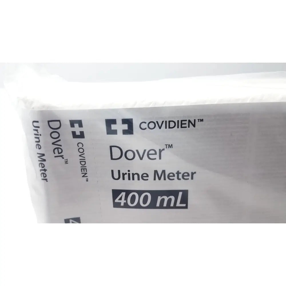 Covidien 2000 dover urine meter 400ml capacity in white plastic bag with black printed branding and measurement markings