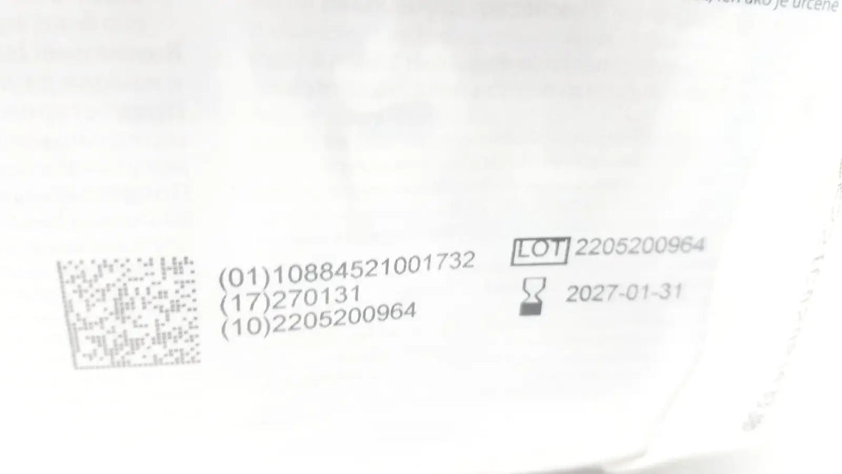 White label with black text and qr code showing lot number 2205200964 and expiration january 31 2027 on covidien dover urine meter 400ml