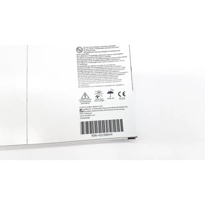 White cardboard packaging backside of covidien 6648kendall transparent film dressing with multilingual safety warnings and barcode
