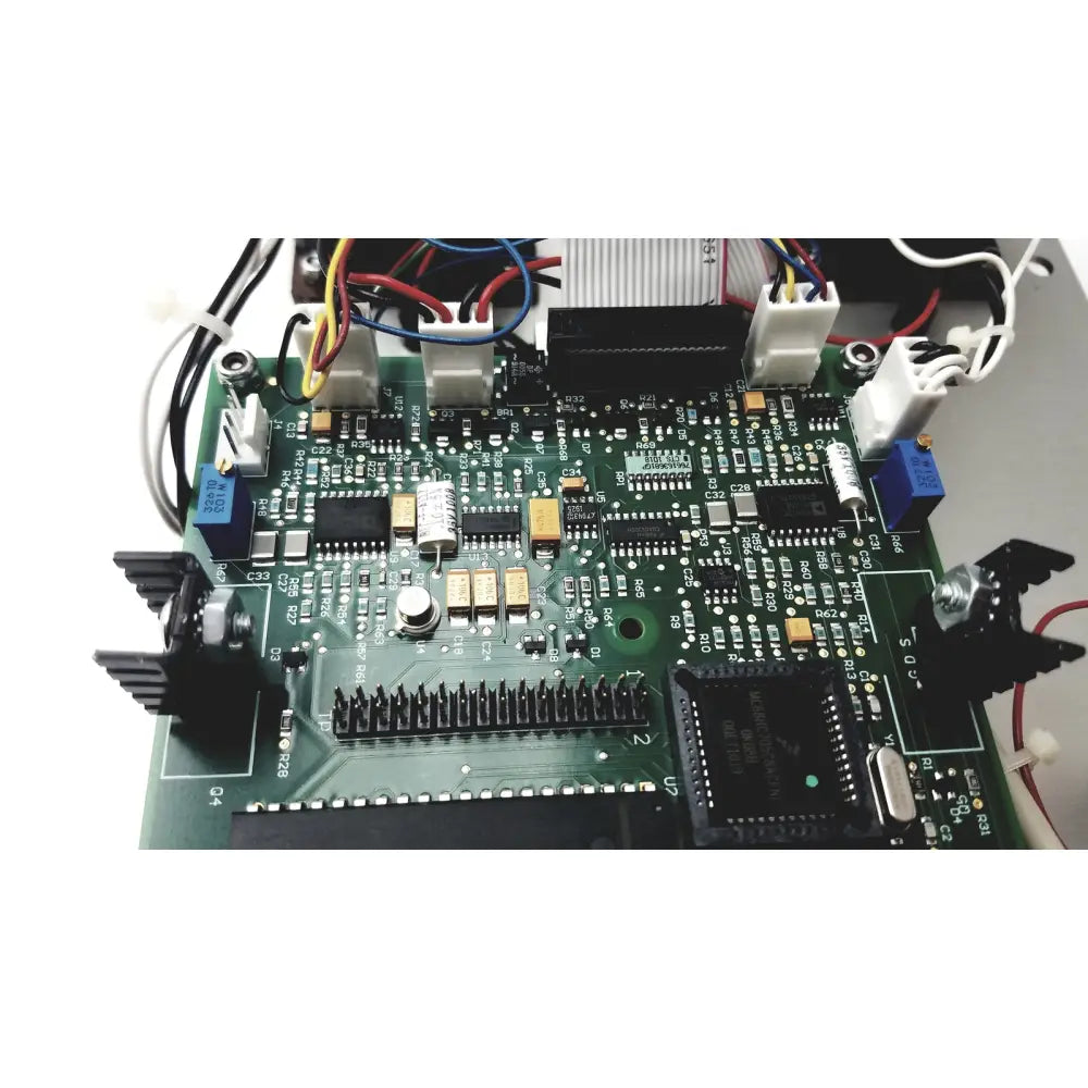 Green printed circuit board with electronic components and wiring of covidien genius 2 checker calibrator test meters