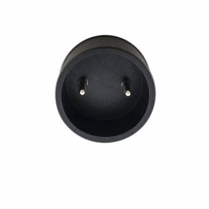 Black cylindrical plug with two metallic prongs on the back side of covidien kangaroo epump enteral feeding pump device