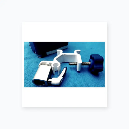 White plastic pole clamp with blue knob and silver screw for secure attachment on Covidien kangaroo joey flush pump