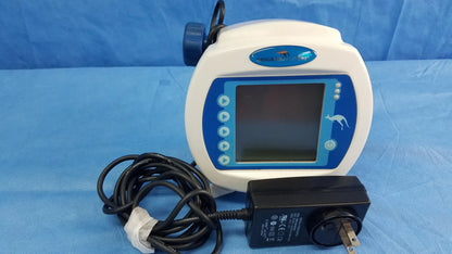 White and blue Covidien kangaroo Joey nutrition feeding pump with digital display control buttons and power adapter