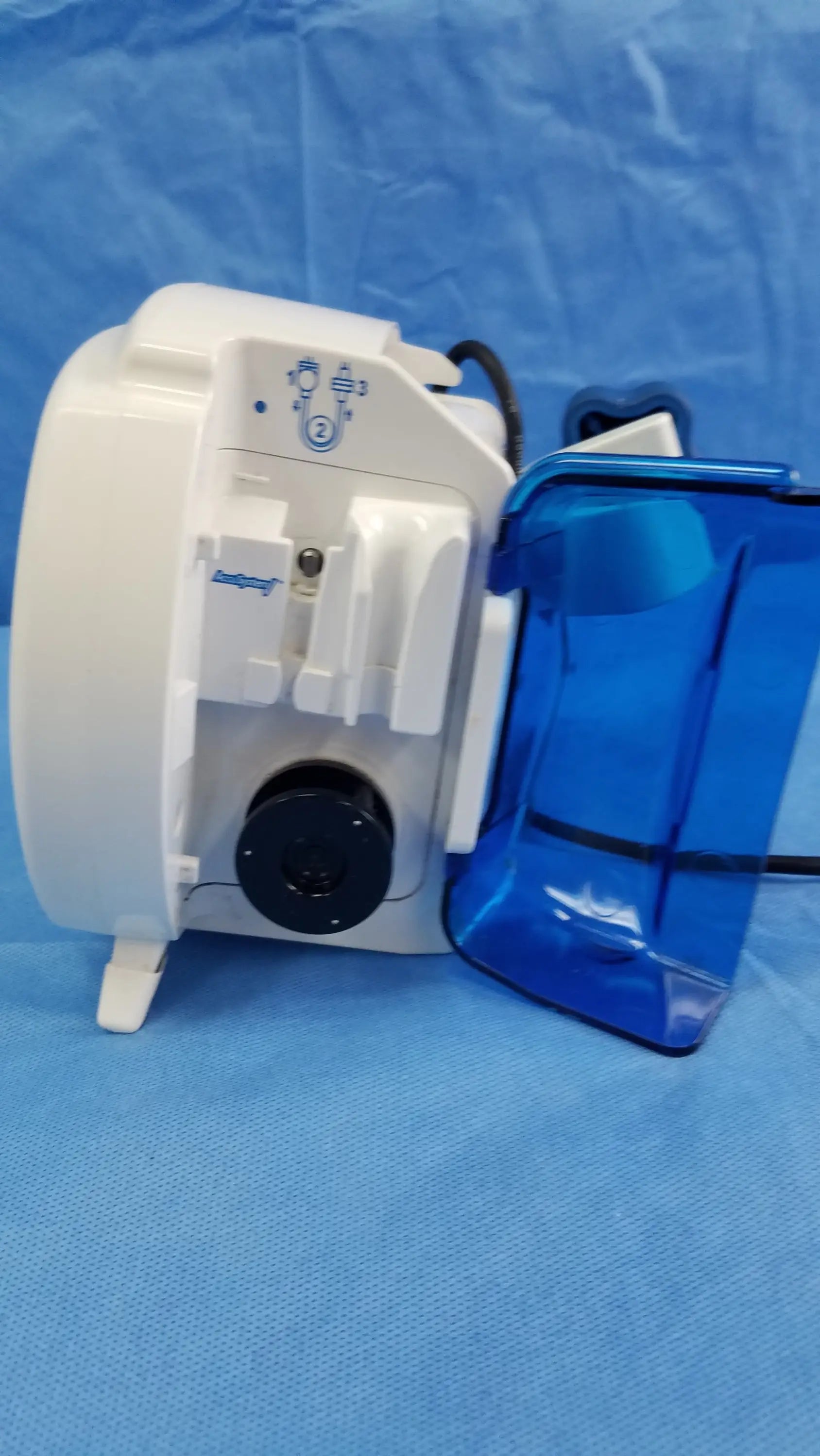 White dental handpiece with blue translucent cover and black circular component for covidien kangaroo joey nutrition feeding pump