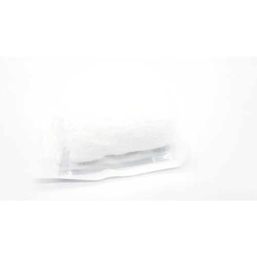 White plastic-wrapped covidien kerlix fluffy gauze bandage roll with faint gray markings sterile 6-ply 4.5 by 4.1 yds