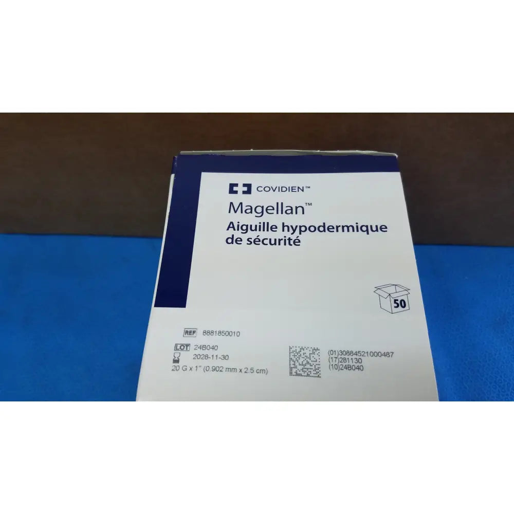 Covidien Magellan hypodermic safety needle package in white and blue with black text for safe injection use