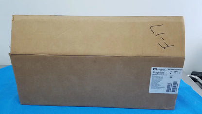 Brown cardboard box with a white label displaying covidien magellan hypodermic safety needle product details