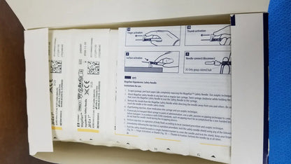Covidien magellan hypodermic safety needles in a cardboard box with printed instructions and safety diagrams visible