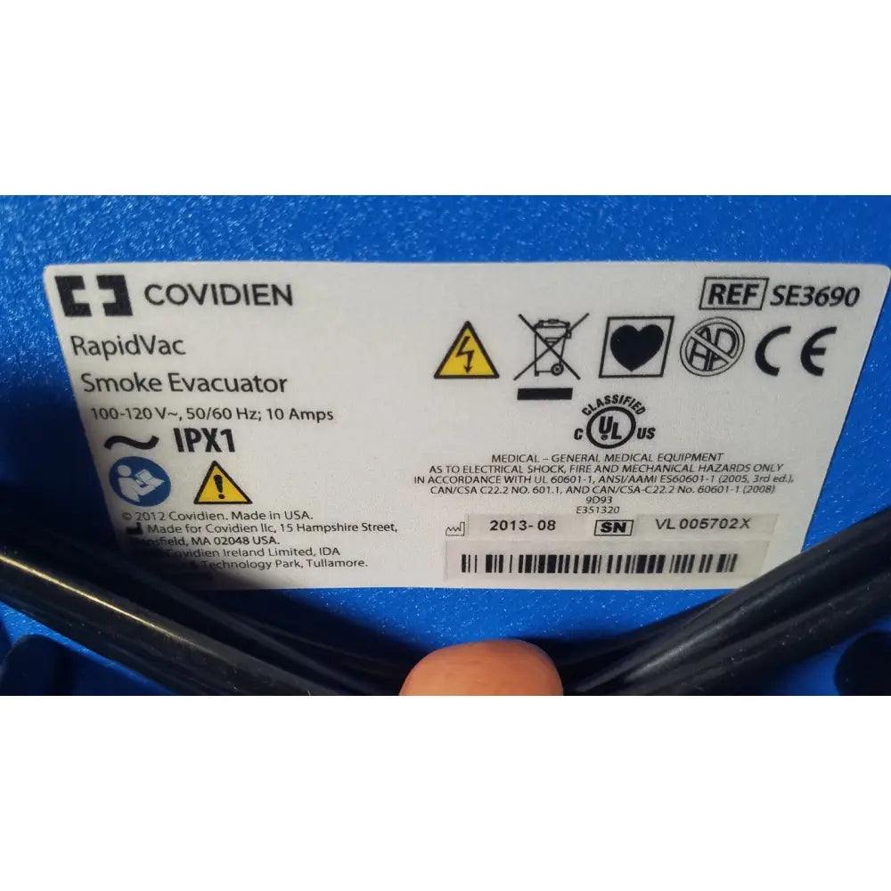 Blue covidien se3690 smoke rapidvac smoke evacuator with white label displaying model number se3690 and safety certifications