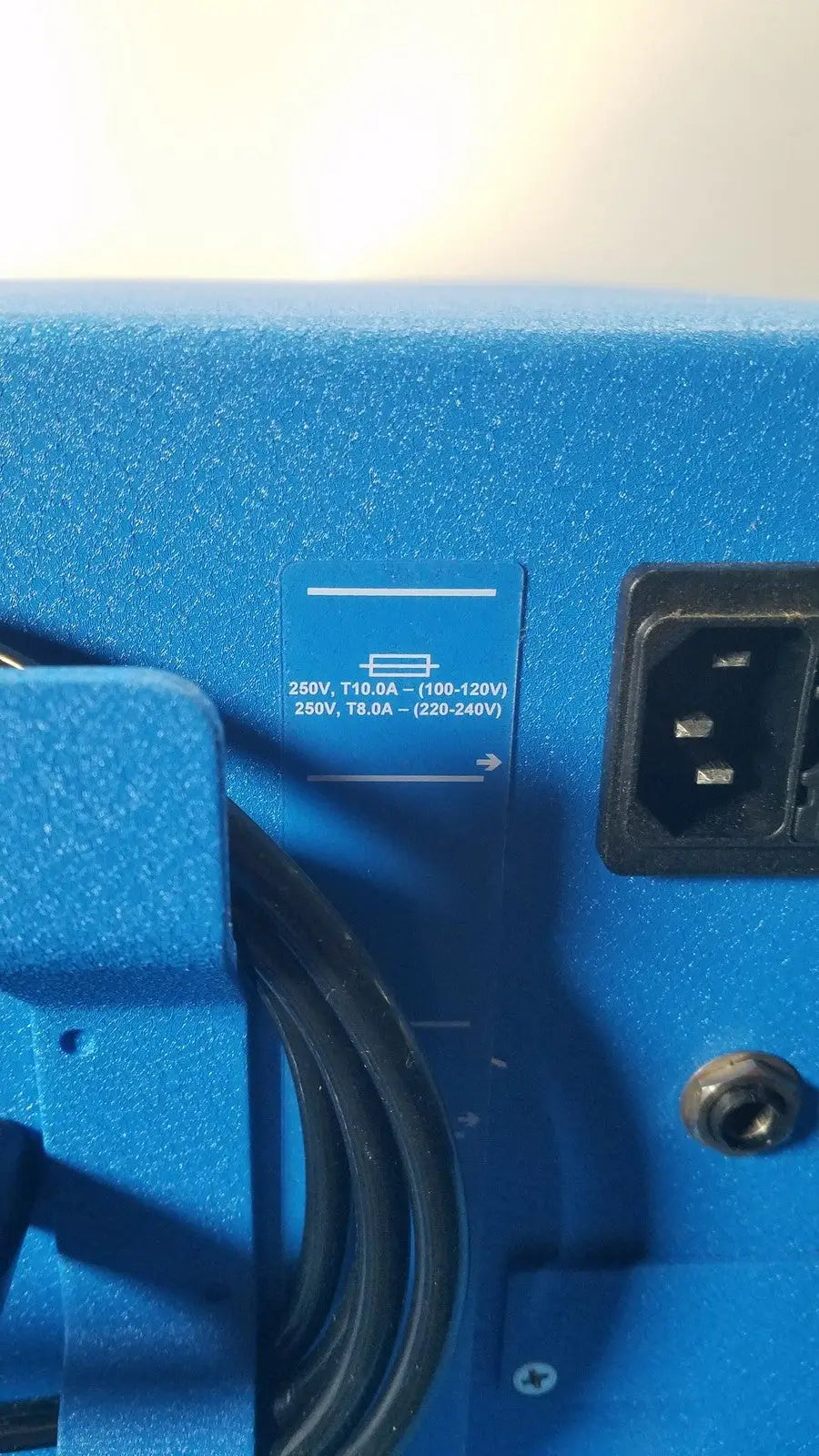 Blue textured power supply unit with black plug and coiled cable for covidien se3690 smoke evacuator