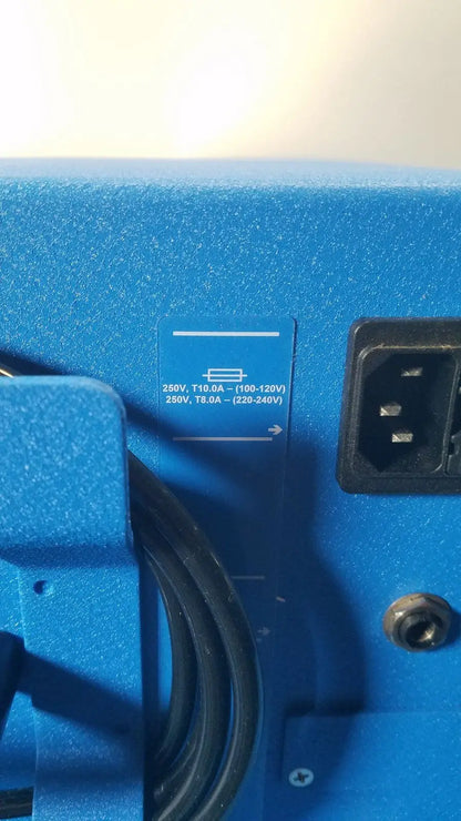 Blue textured power supply unit with black plug and coiled cable for covidien se3690 smoke evacuator