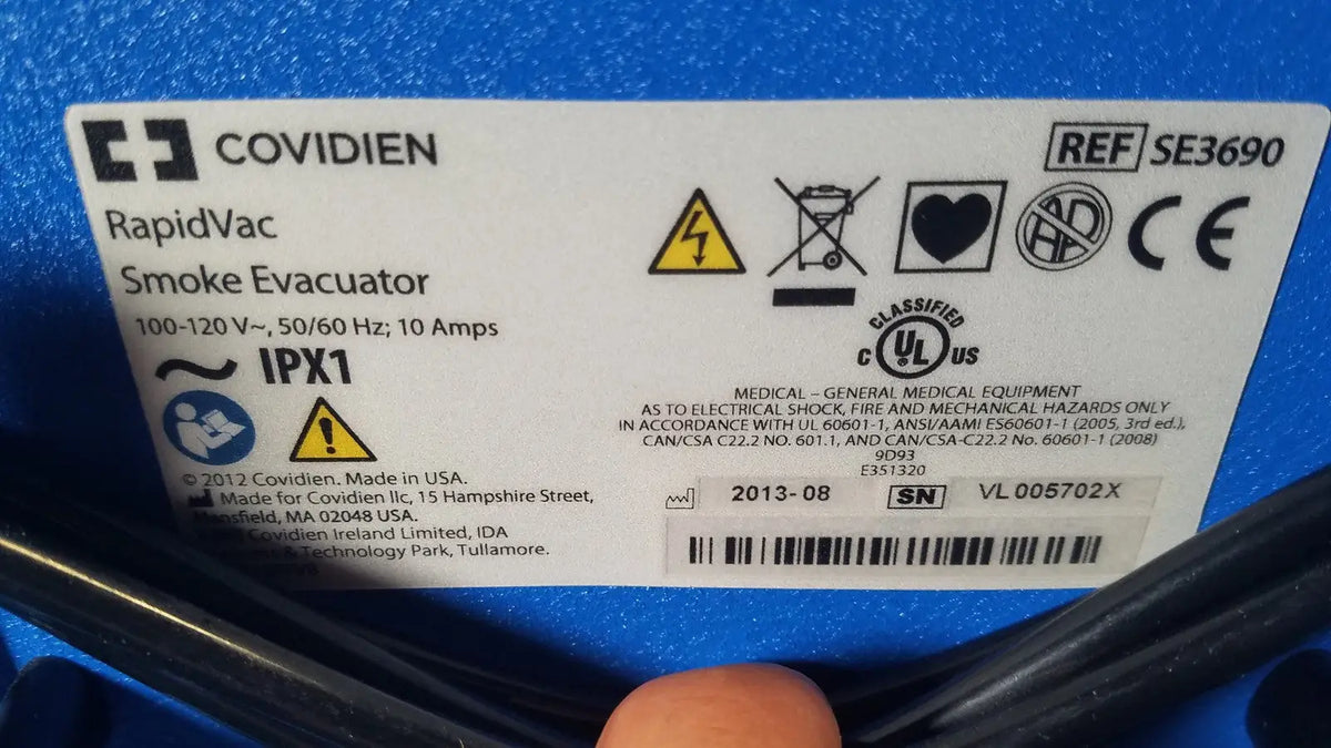 Blue covidien se3690 smoke rapidvac smoke evacuator with white label displaying model number se3690 and safety certifications