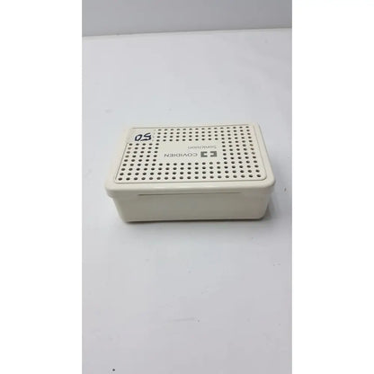 Cream-colored plastic covidien sonicision sterilization container tray with perforated lid for secure sterilization use
