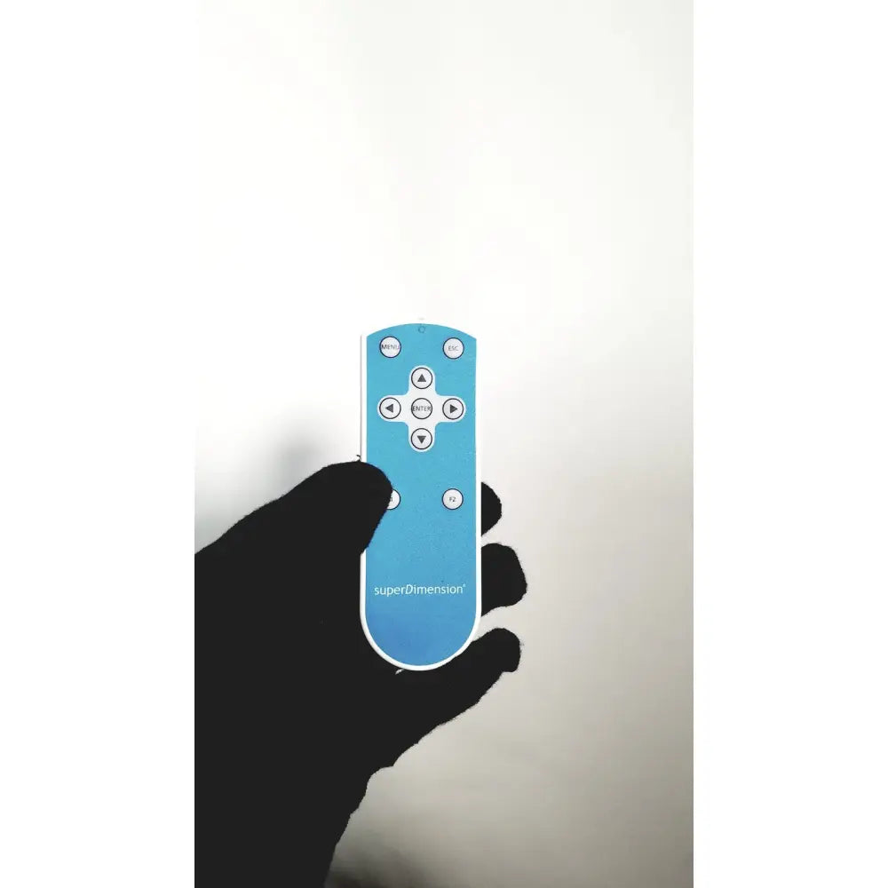 A light blue Covidien super dimension remote control with white buttons for the Covidien Super Dimension I Logic In Reach system