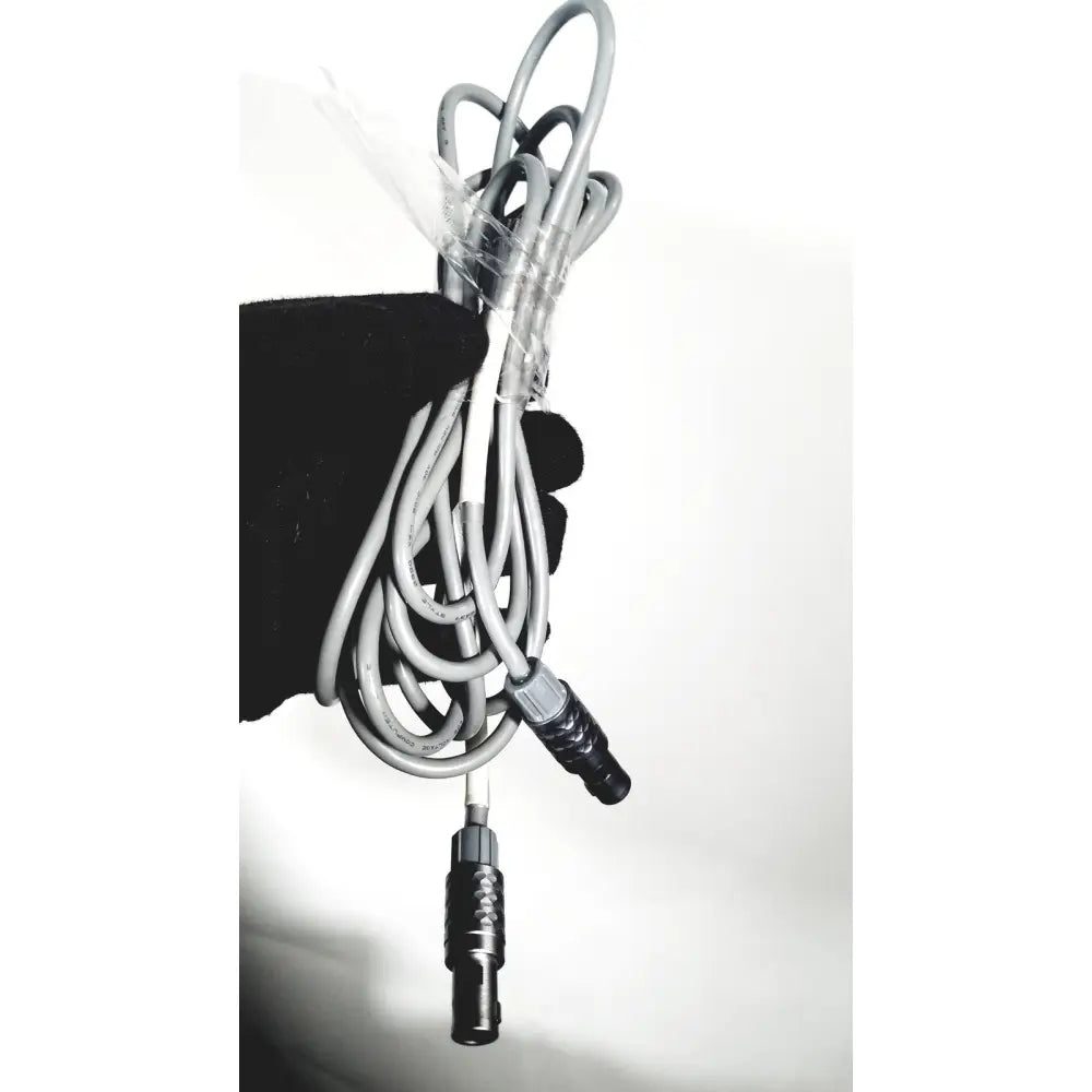 Gray coiled cable with black connectors and clear plastic tie for covidien super dimension i logic in reach navigation system