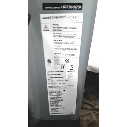 Back side of gray covidien super dimension covidien super dimension i logic in reach navigation system with label and serial number