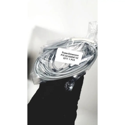 Gray coiled cable in clear packaging with covidien super dimension label for logic in reach navigation system