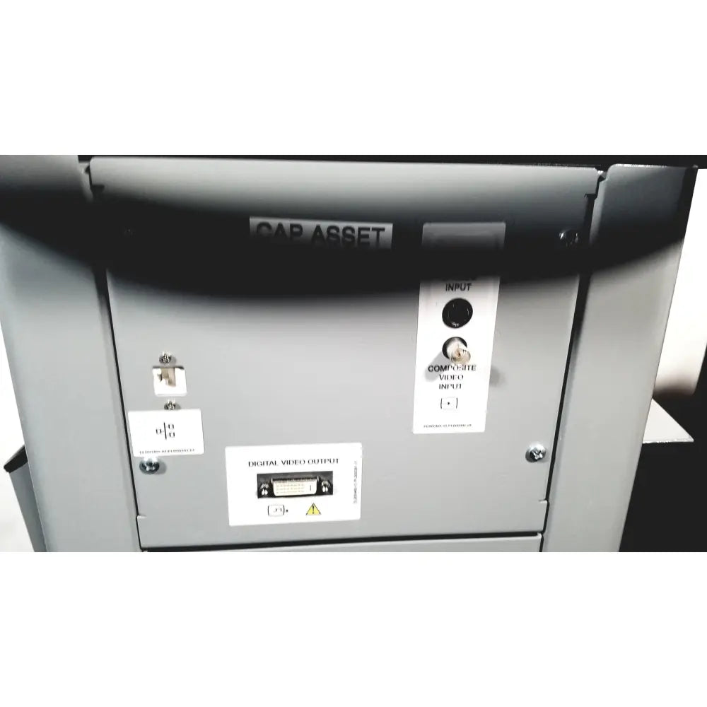 Gray metal covidien super dimension i logic in reach navigation system cabinet with labeled ports and black strap on top