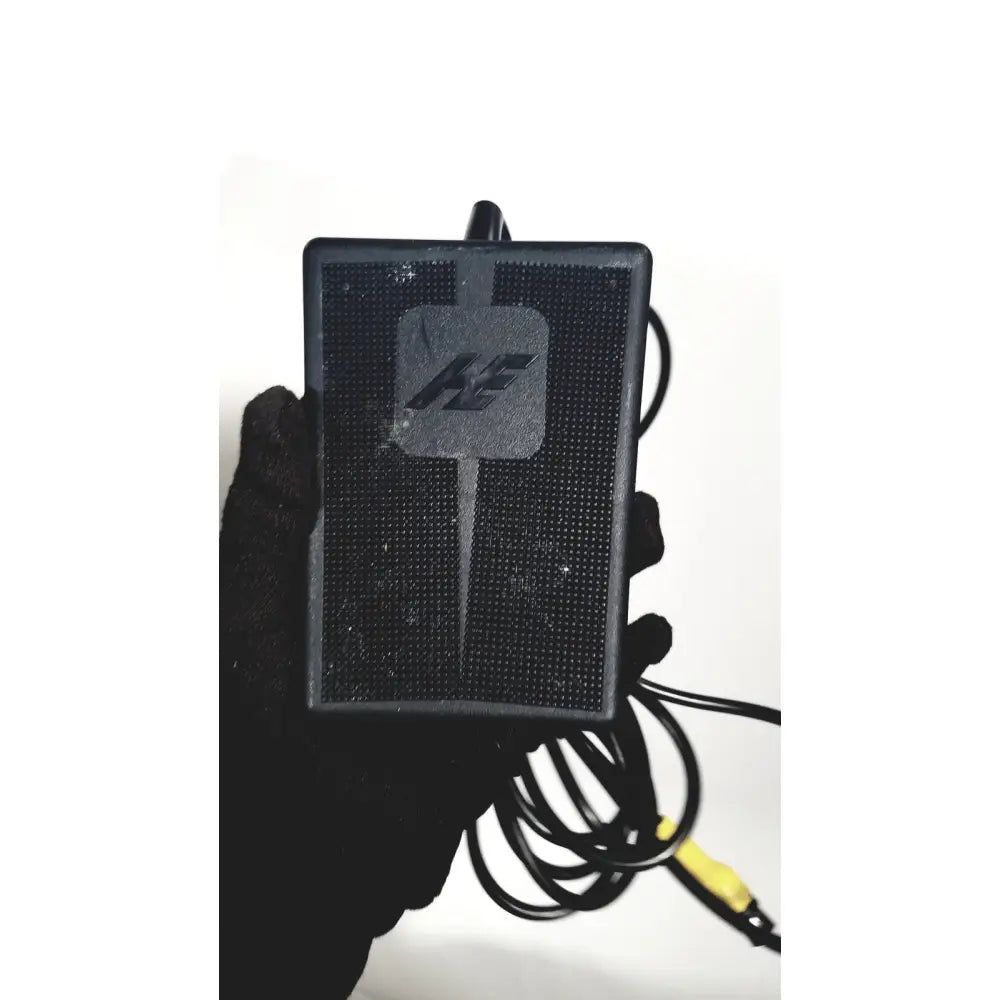 Black covidien super dimension foot pedal with textured surface and coiled cable for logic in reach navigation system