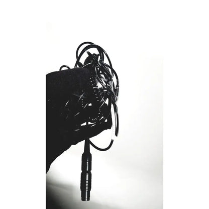 A tangled black cable with a textured ribbed connector for the covidien super dimension i logic in reach navigation system