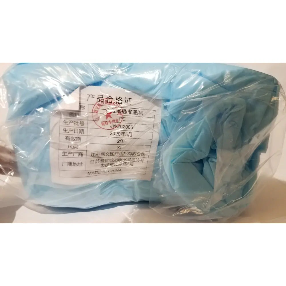 Light blue cpe isolation gown disposable medical-grade pe material individually wrapped in clear plastic bag