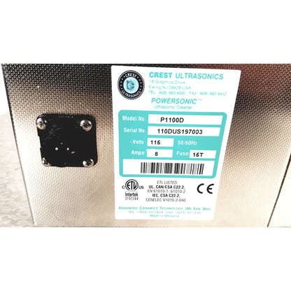 Silver metallic crest ultrasonic powersonic cleaner model p1100d with white label showing specifications
