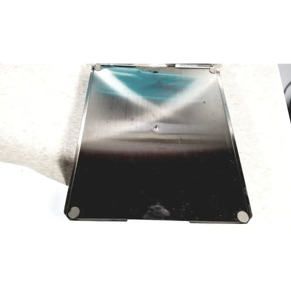 Stainless steel laptop base with black lower half and reflective upper surface of crest ultrasonic powersonic cleaner model p1100d