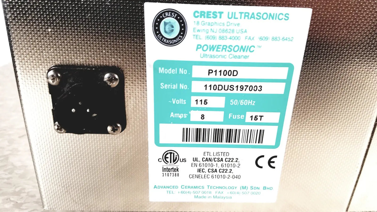Silver metallic crest ultrasonic powersonic cleaner model p1100d with white label showing specifications