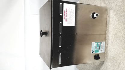 Stainless steel industrial-grade water heater with black accents and warning labels on crest ultrasonic powersonic cleaner model p1100d