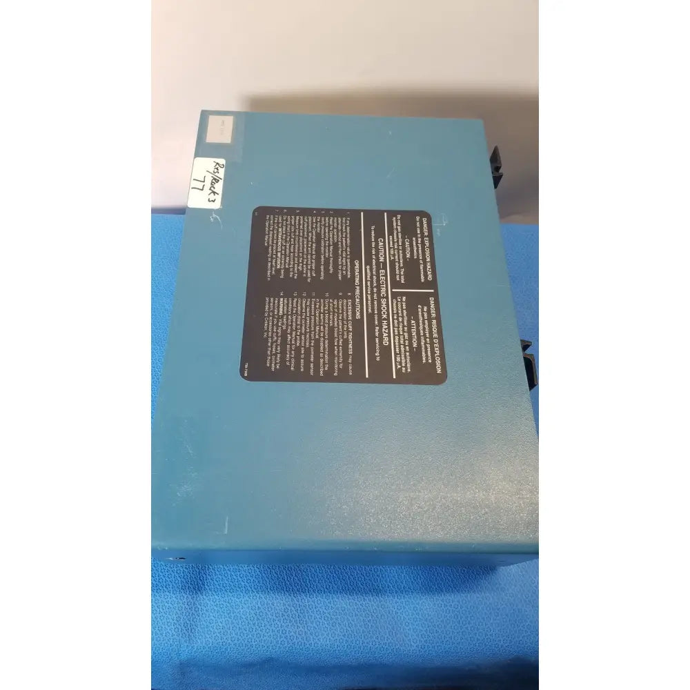 Light blue rectangular industrial battery unit with safety and technical labels for critikon dinamap 1846 sx vital signs monitor