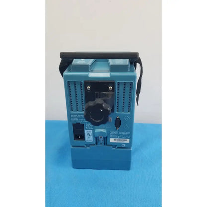 Blue makita power tool with black handle and control knob shown alongside critikon dinamap plus vital signs monitor 8726 rad not turning on
