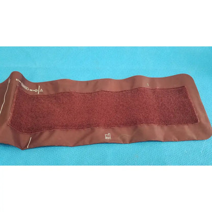 Brown critikon dura-cuf large adult blood pressure cuff with textured inner surface and printed measurement markings
