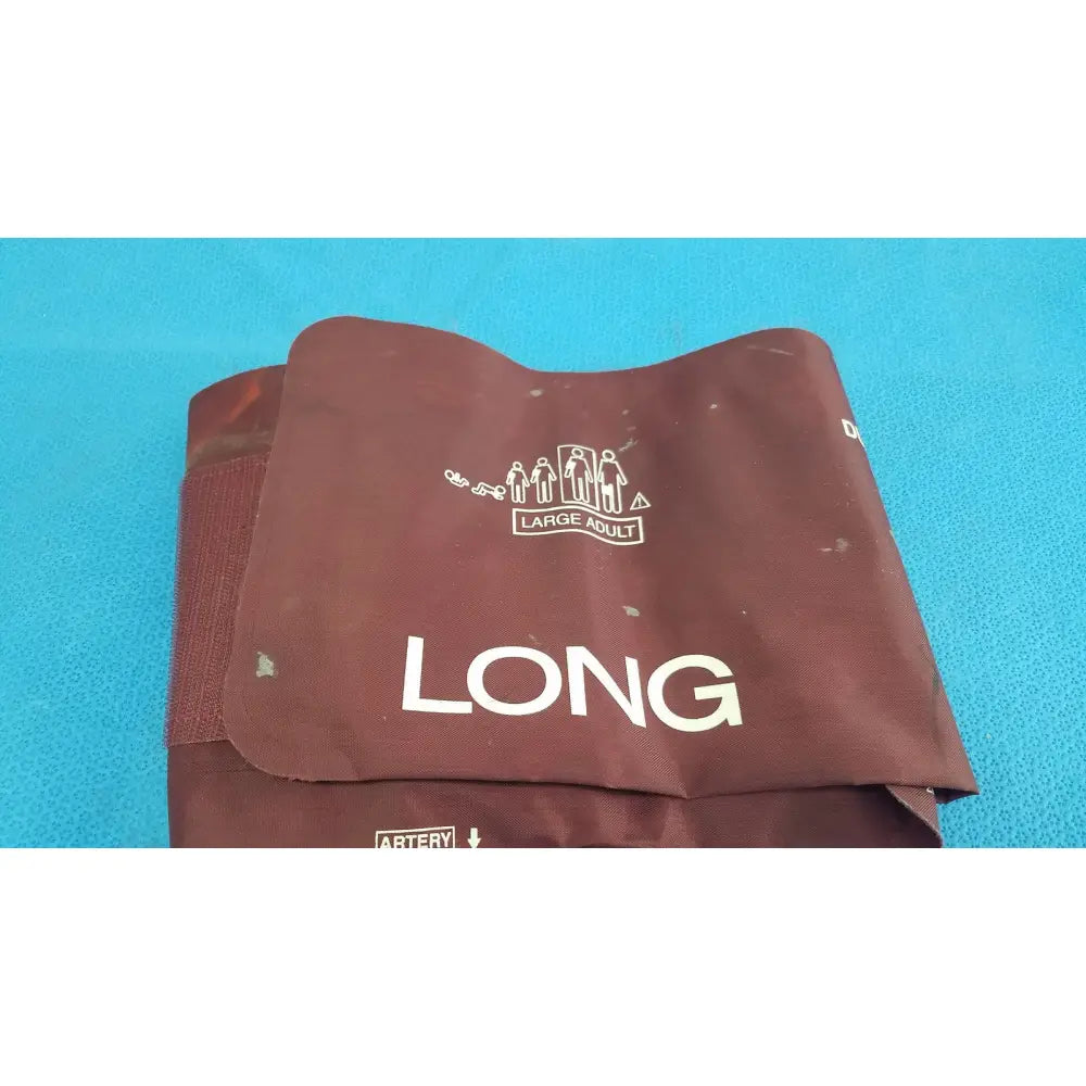 Brown fabric large adult blood pressure cuff with white text and logo for adult blood pressure measurement