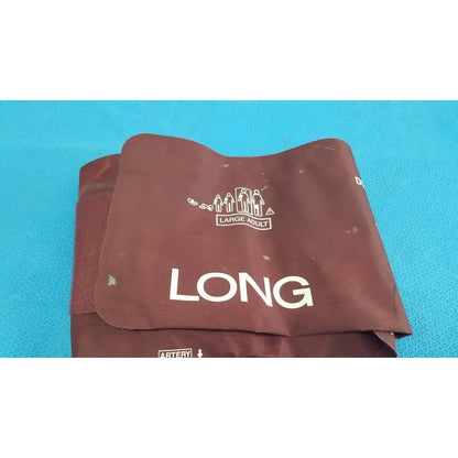 Brown fabric large adult blood pressure cuff with white text and logo for adult blood pressure measurement